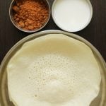 appam served with coconut milk and brown sugar