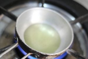 heat a tadka pan and add oil