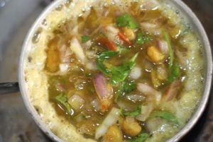 add the beaten prawn karandi omelette mixture