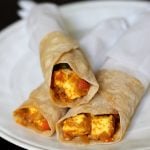 wrapped Paneer roll in a plate
