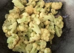 par boiled cauliflower in a pan